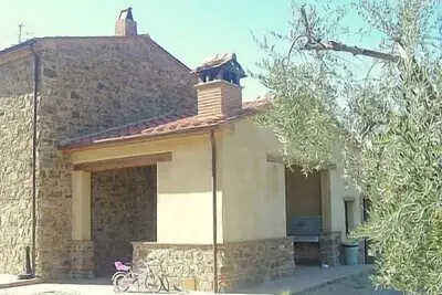 Image de Villa Verena: Une splendide villa de deux étages dans le style caractéristique de la campagne toscane.