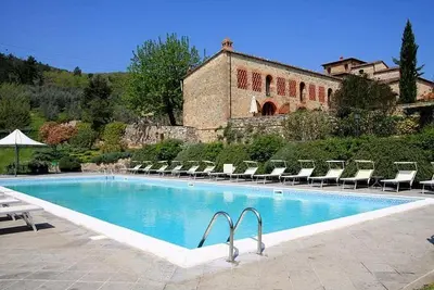 Image de Borgo Bello B: Un appartement confortable dans le style caractéristique de la campagne toscane.