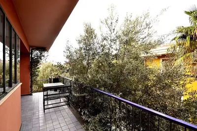 Image de Casa Ntoni C: Un appartement moderne et agréable situé à une courte distance de la plage.