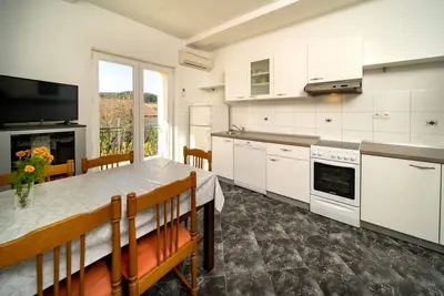 Image de Appartement dans Lopar avec terrasse, Climatisation, Wifi, Machine à laver (129-1)