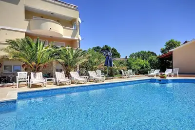 Image de Appartement avec piscine, air conditionné, à seulement 700 mètres de la plage de sable