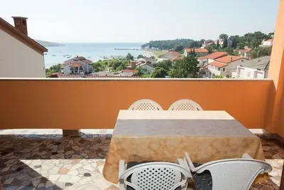 Image de Appartement dans Lopar avec vue mer, terrasse, Climatisation, Wifi (178-1)