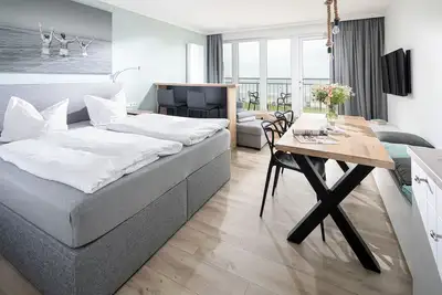 Image de Studio une pièce Kaiserhof 32 Norderney avec vue mer et piscine
