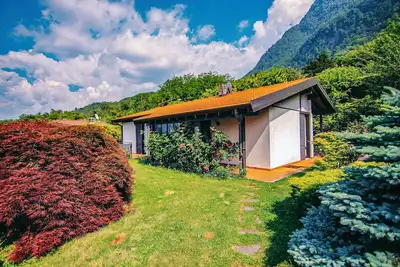 Image de Maison de 4 pièces ½ avec grand terrain et vue sur le lac de rêve dans un endroit calme et ensoleillé