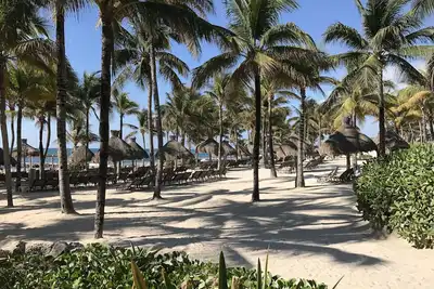 Image de Paradis tropical - 50% de réduction sur le forfait de golf Palais maya prestigieux 150 $ par nuit