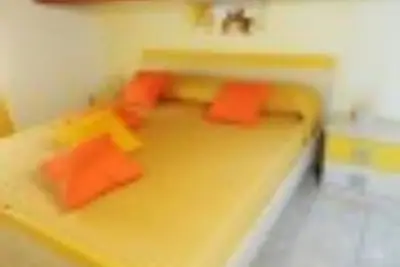 Image de Grenier jaune aux appartements Cocorito
