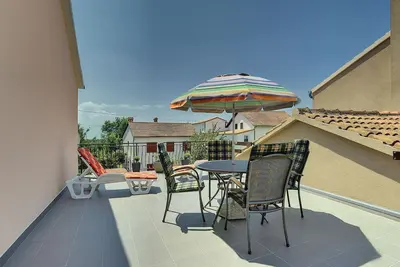 Image de A seulement 900 mètres d'une plage de sable avec barbecue