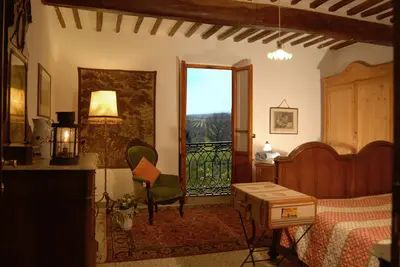 Vacances dans un appartement à l'intérieur d'une ferme biologique historique, avec piscine