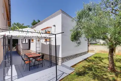 Image de Maison de vacances bon marché à 900 mètres d'une plage de sable