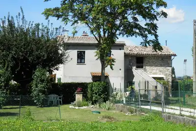 Image de Casa Vincia 5-6 lits sur deux niveaux avec un grand jardin