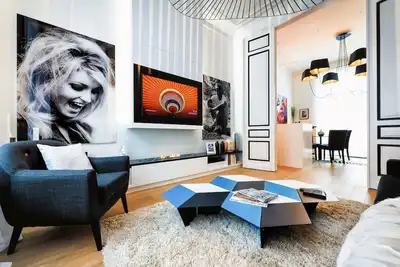 Image de Quartier Louise - Duplex Design avec Grande Terrasse en Bois