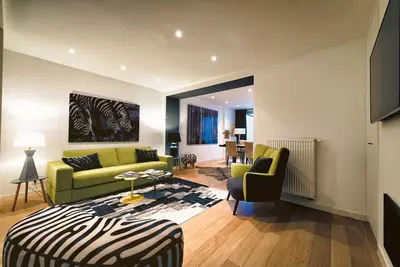 Image de Avenue Louise - Appartement Contemporain avec Jardin Privé