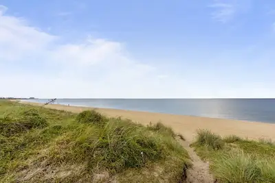 Image de Front de mer sur la Baie Dans Notre Chalet de Plage Rustique