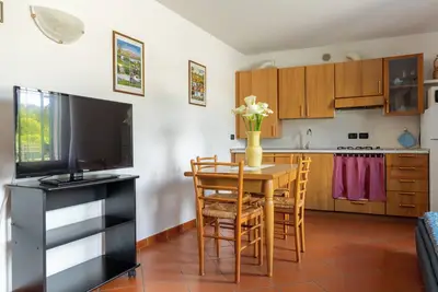 Image de Appartement dans une ferme, Venise. Chambre, salle de bains, cuisine / salon complète.