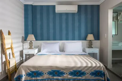 Image de Mini Suite Premium avec Vue sur la Mer et Piscine Commune (A2) + Bb