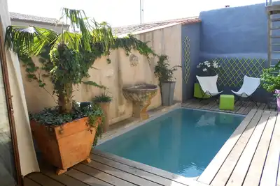 Image de Spacieux duplex en coeur de ville avec sa piscine sur le toit