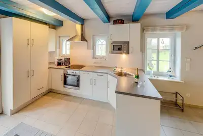 Image de Appartement 5 étoiles sous chaume dans un endroit calme avec une vue unique