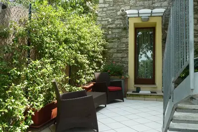 Image de Maison Titti est un coin précieux de détente au cœur de la Crete Senesi.