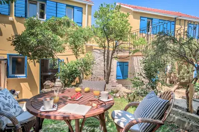 Image de Aparthotel The Dreamers 'Club, application Uni-espace. Jardin avec 1 lit double