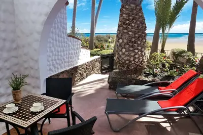 Image de Studio de luxe pour les amoureux de la plage - Appartement en bord de mer sous les palmiers