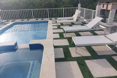 Image de Joy Estate, belle maison de 3 chambres et 2 salles de bain, à quelques minutes de la plage,