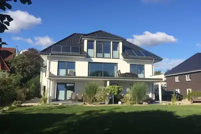 Image de Appartement moderne et relaxant au bord du lac, sous-pension + vélos