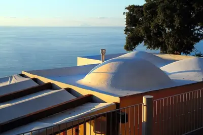 Image de Villa Dammuso – Piscine à Débordement et Vue Mer de Rêve