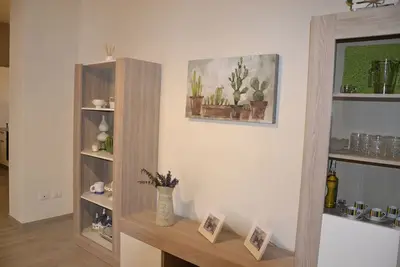 Image de Garden House, le vignoble et les oliviers