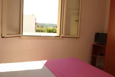 Image de Appartement mansardé de deux pièces avec vue à seulement 100 mètres de la plage de Torre Mozza