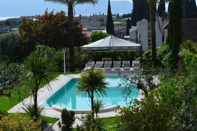 Image de Casa dei Limoni: appartement raffiné dans une ancienne résidence avec piscine et solarium