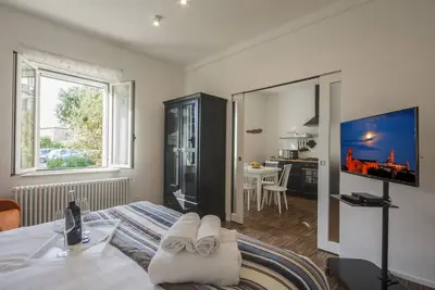 Image de Studio avec jardin (à 2 km du centre) - En dehors de la Ztl - Parking gratuit