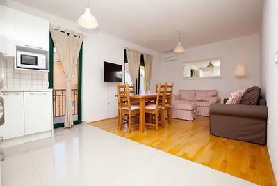 Image de Appartement 4 + 2 avec deux chambres, wifi, parking privé, près de la plage