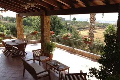 Image de Petalo Rosso, appartement dans villa avec jardin et magnifique vue panoramique