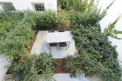 Image de Opo-Apt 110-0 Pateo Appartement dans le centre-ville. Jardin privé rien que pour vous.