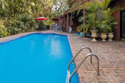 Image de Maison tropicale près du stade Hard Rock et des plages. Piscine chaufee.
