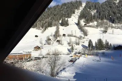 Image de Chalet Lenk Dänk App. 6 by Interhome