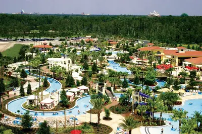 Image de Villa près de Walt Disney World | Terrains de golf, piscines, rivière lente et plus
