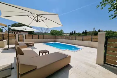 Image de Maison de vacances avec climatisation et piscine