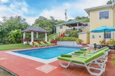 Image de Spacieuse villa familiale, Cap Estate Resort, piscine, climatisation, service de cuisine / aide domestique, Wifi gratuit, à proximité des plages!