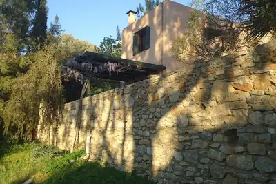 Image de Landhaus Achladia charmée avec jardin, vue sur la mer, la tranquillité et les couchers de soleil