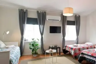 Image de 3 appartements confortables avec garage et Netflix