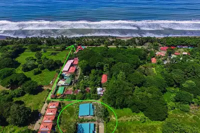 Image de Location pour grand groupe - 2 nouvelles maisons cĂ´te Ă cĂ´te Ă quelques pas de la plage, bars, restaurants!