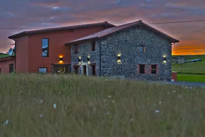 Image de Maison pour grands groupes face à la plage