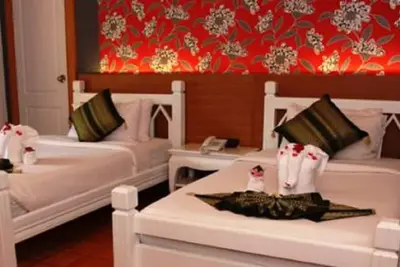 Image de Resort près de la plage, une chambre avec jardin