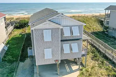 Image de K0070 T. L. Sea Ocean Front, salle de jeux, ponts spacieux, passage privé à la plage