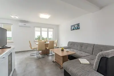 Image de Three-Bedroom Apartment Smilys Ii