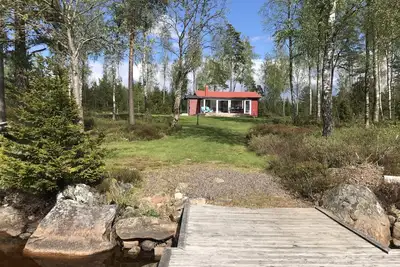 Image de Jardin d'hiver et salon avec vue sur le lac, 2 chambres à coucher.