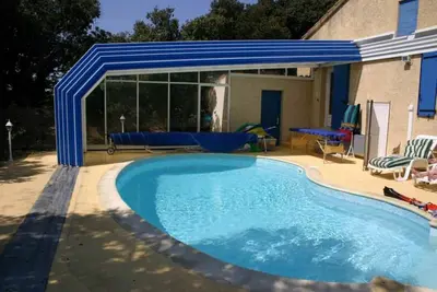 Image de Villa sur 10ares dans un quartier calme avec piscine chauffée, tout confort