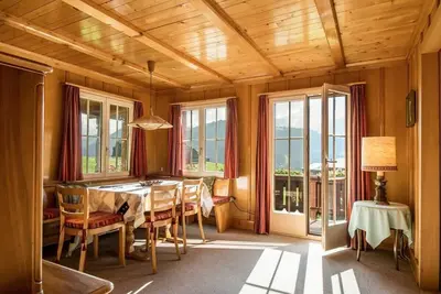 Image de Gstaad Duplex Flat - Magnifique chalet au bord du lac avec étang