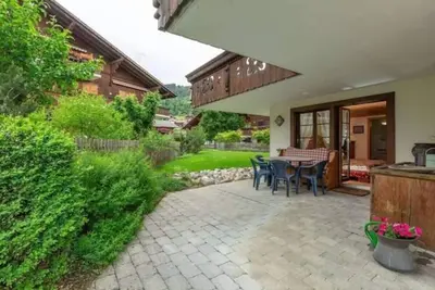 Image de Appartement idéalement situé au rez-de-chaussée dans le centre de Saanen